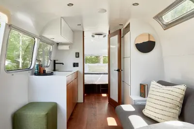 a kitchen and living room in a tiny house at AutoCamp Sequoia in Three Rivers