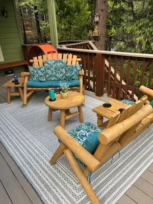 a porch with two chairs and a table and a couch at Anderson's Alpine Retreat- Pinecrest, CA Dodge Ski in Cold Springs