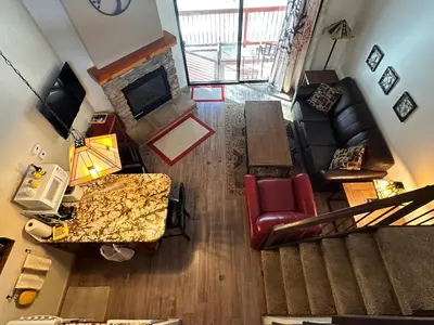 an overhead view of a living room with a fireplace at Yosemite Condominium Loft unit -B202 in Yosemite West