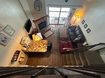 an overhead view of a living room with a couch at Yosemite Condominium Loft unit -B202 in Yosemite West