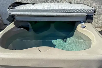 a rear window of a car with a trunk at Outdoor Oasis and Hot Tub! Spacious Clovis Home in Clovis