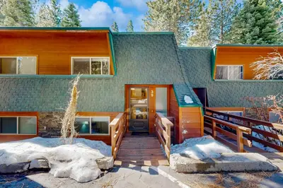 a house with a wooden ramp leading to the front door at Take a Peak in Incline Village