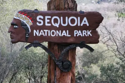 a sign for a national park with a snake on it at Sequoia Villa in Visalia
