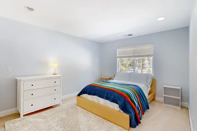 a bedroom with a bed and a window at Andria Grove in Stateline