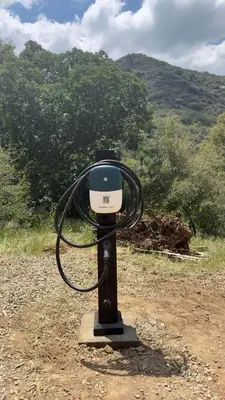 a light on a pole in the middle of a field at Paradise Ranch Inn- Infinite House Hot Tub,Sauna in Three Rivers