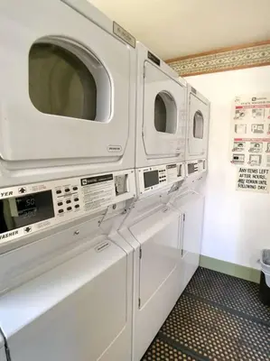 a kitchen with three microwaves on the wall at Rustic Modern Condo - Close to Village - Sleeps 10 in Mammoth Lakes
