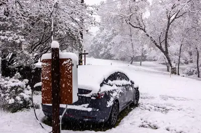 a car parked in a snow covered yard at Mountain View, near Yosemite & Bass Lake, BBQ, Fireplace,EVC in Oakhurst