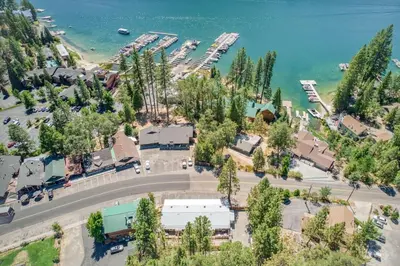 an aerial view of a marina with a group of boats at #3 Cottage Like Suite With Private Hot Tub in Bass Lake