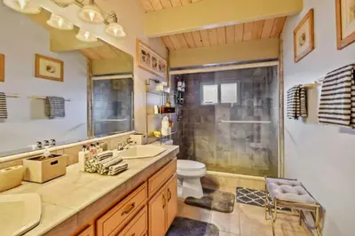 a bathroom with a sink and a toilet and a shower at Incline Village Getaway in Incline Village