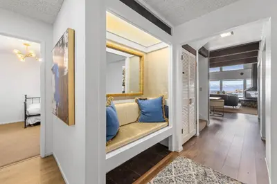a hallway with a window seat in a house at Towering Pines Lakefront - 3 BR w Hot Tub & Buoy in Tahoe City