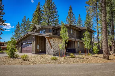 a house in the woods with trees at Crestwood at Schaffer's Mill in Truckee