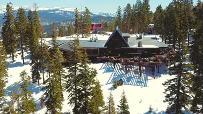 an aerial view of a house in the snow at The Cottages - Ski Shuttle, Ski Valet - 2-Bedroom in Truckee