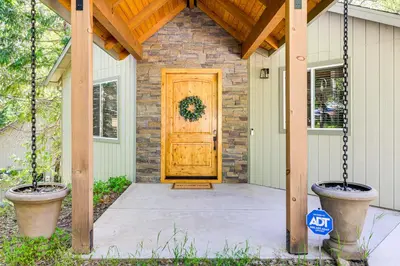 a front door of a house with a porch at Game Room and Patio Picturesque Home in Sonora in Sonora