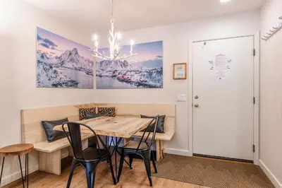 a dining room with a table and chairs at Fully Renovated! St Anton #17 Ski in Ski Out 1 Bedroom 1 Bathroom Condo! Sleeps up to 4! in Mammoth Lakes