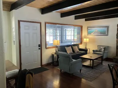 a living room with a couch and a table at Mountain Escape in South Lake Tahoe