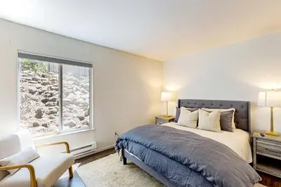 a bedroom with a bed and a window at Sierra Tranquility in Incline Village