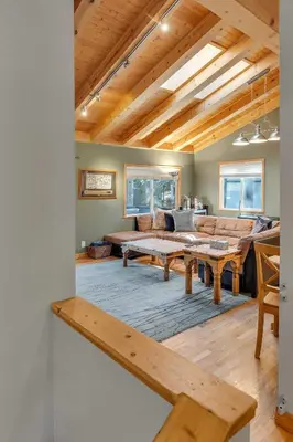 a living room with a couch and a table at 3BR with Hot Tub 1 Mile to Diamond Peak in Incline Village