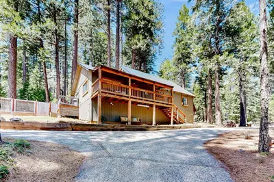 a large house in the middle of a forest at The Venado House in Arnold