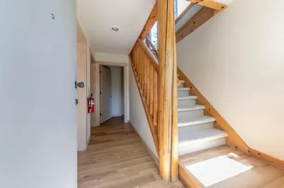 a stairwell in a home with wooden floors at 4BD with Lake Views Near Beach and Slopes in Tahoe City
