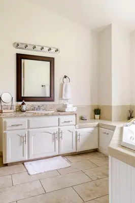 a white bathroom with a sink and a mirror at Willow Nest - Sequoia And Kings Canyon Villa - Luxury In Nature in Hoffman Point