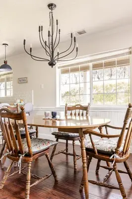 a dining room with a wooden table and chairs at Willow Nest - Sequoia And Kings Canyon Villa - Luxury In Nature in Hoffman Point