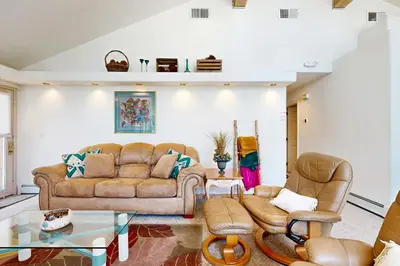a living room with a couch and chairs at Livin' Lake Life in Incline Village