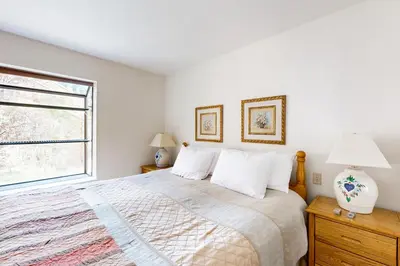 a bedroom with a bed and a window at McCloud 176 in Incline Village