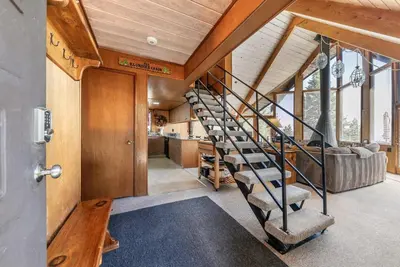 a staircase in a house with a living room at 4BR Tahoe Retreat in Prime Location in Tahoe City