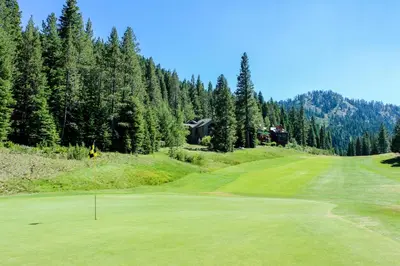 a view of a golf course with a green at Tavern Inn #38 in Olympic Valley