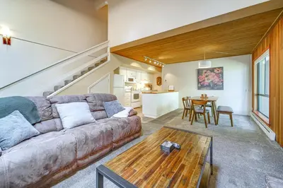 a living room with a couch and a table at 2 Mi to Beach Inviting Incline Village Escape in Incline Village