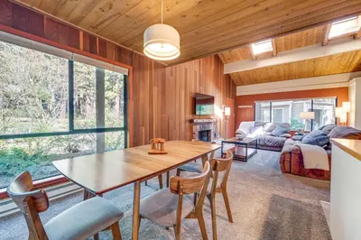 a kitchen and living room with a table and chairs at 2 Mi to Beach Inviting Incline Village Escape in Incline Village