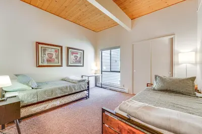 a bedroom with two beds and a window at 2 Mi to Beach Inviting Incline Village Escape in Incline Village