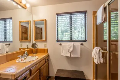 a bathroom with a sink and a shower at Snowflower #79 - Updated 2 Bedroom & Loft, 3 Bath, Sleeps 8, Steps away from Free Town Shuttle in Mammoth Lakes