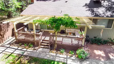 an overhead view of a house with a wooden pergola at Home in the Pines - Apple Hill - Dog Friendly - Snow Nearby in Pollock Pines