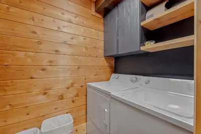 a laundry room with a washer and dryer at 3BR with Sauna & Lake Views, 2 miles to Beach in Tahoe City