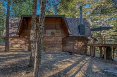 a log cabin in the woods with trees at 3BR with Sauna & Lake Views, 2 miles to Beach in Tahoe City