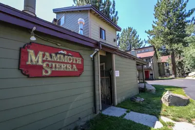 a sign on the side of a building at Mammoth Sierra Townhomes #23 condo in Mammoth Lakes