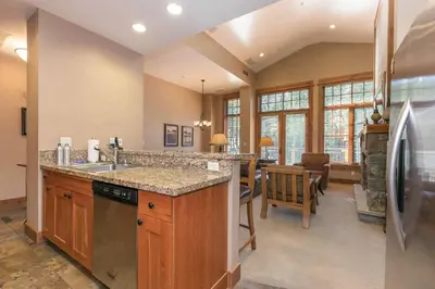 a kitchen with a sink and a counter top at Big Horn Lodge 510 by East West Hospitality in Truckee