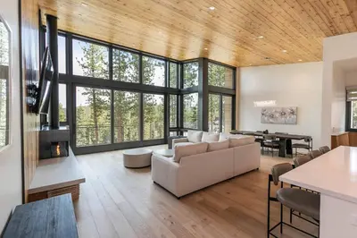 a large living room with a couch and a table at Boulders 15136 by East West Hospitality in Truckee