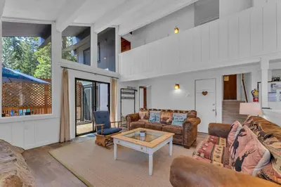 a living room with couches and a coffee table at Bright 3BR Near Kings Beach and Northstar in Tahoe Vista