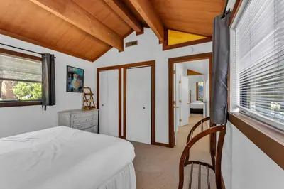 a bedroom with a bed and a window at Bright 3BR Near Kings Beach and Northstar in Tahoe Vista