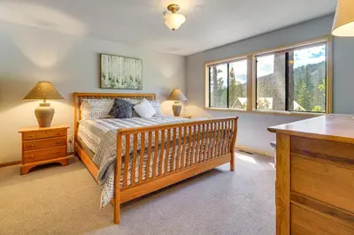 a bedroom with a bed and a window at Close to Ski Slopes Tahoe Ski Chalet with Fireplace in Tahoe City