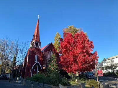 a church with a red tree in front of it at Private Country Home Near Downtown - Sonora in Sonora