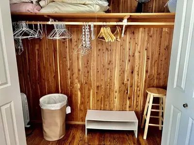 a room with a wooden wall with a bunk bed at Private Country Home Near Downtown - Sonora in Sonora