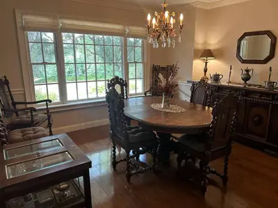 a dining room with a table and chairs and a mirror at Private Country Home Near Downtown - Sonora in Sonora