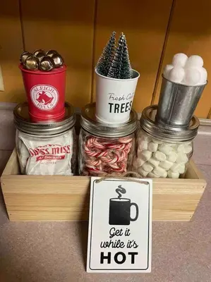 a wooden shelf with four jars of food and a sign at Cozy Chalet - Hot Tub with Meadow Views - Family & Pets, Fire Pit & BBQ in Arnold