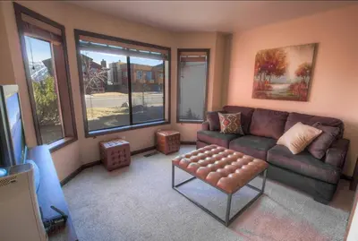 a living room with a couch and a table at Epiphany home in South Lake Tahoe