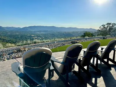 a group of chairs sitting on top of a table at Enchanted Property near Yosemite, View, Game Room in Ahwahnee