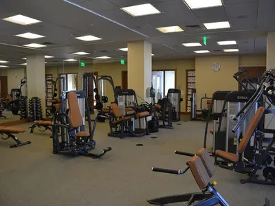 a gym with a lot of treadmills and machines at Penthouse Residence The Ritz-Carlton Lake Tahoe in Truckee