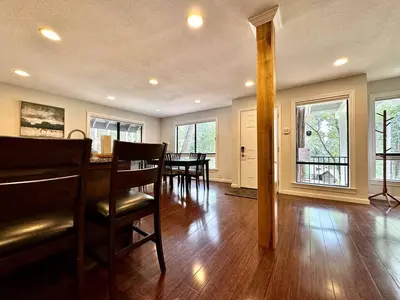 a kitchen and dining room with a table and chairs at Cabin in the Trees-Game Room in Pollock Pines